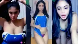 Kylie Dengan Gaun Biru Dan Payudara Yang Menggoda