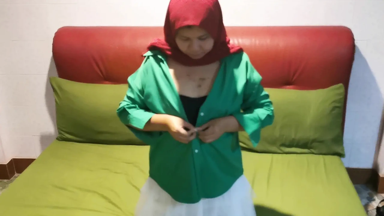 Hijab Girl Plucks Under A White Skirt